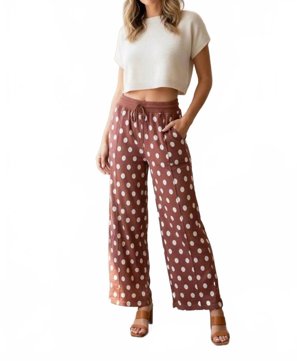 NEW UMGEE pop of polka barrel pants in rust